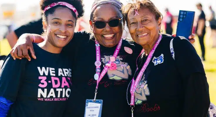 a group of women standing next to each other